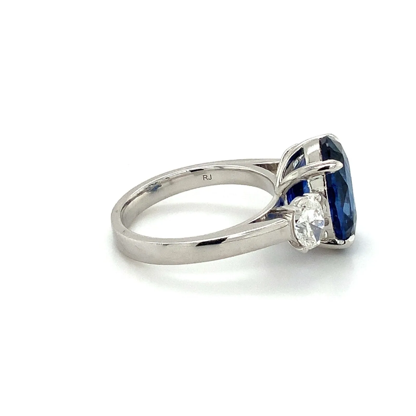 Roman Jules Gem Quality 7.64ct Three Stone Oval Ceylon Blue Sapphire and Diamond Ring set in Platinum